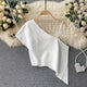 Lily One Shoulder Top - styled flat-lay shot, white - Miss Mosa By Akanksha