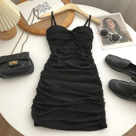 Limba Ruched Mini Bodycon Mesh Dress - styled flat-lay shot, black - Miss Mosa By Akanksha