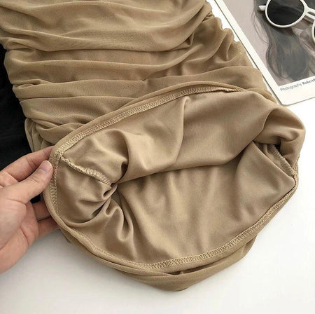 Limba Ruched Mini Bodycon Mesh Dress - close-up of hem lining, beige - Miss Mosa By Akanksha