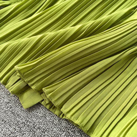 Loila Pleated Blouse - close-up of pleated hem, green - Miss Mosa By Akanksha