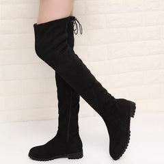 Luxury Flat Suede Boots - side shot on model, black - Miss Mosa By Akanksha