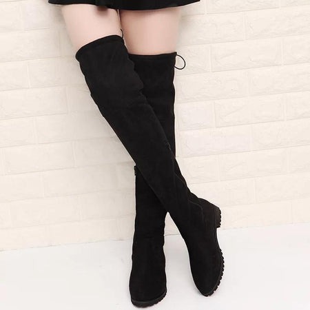 Luxury Flat Suede Boots - front shot on model, black - Miss Mosa By Akanksha