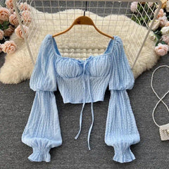 Lyra Statement Top - front shot on hanger, blue - Miss Mosa By Akanksha