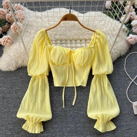 Lyra Statement Top - front shot on hanger, yellow - Miss Mosa By Akanksha