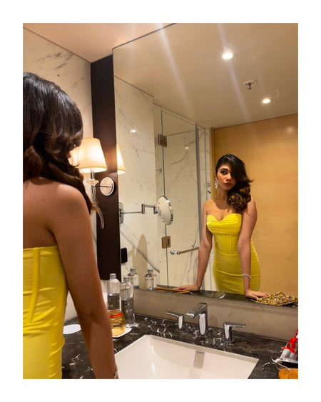 Miranda Corset Midi Dress in Lime - lifestyle shot on model, yellow - Miss Mosa By Akanksha