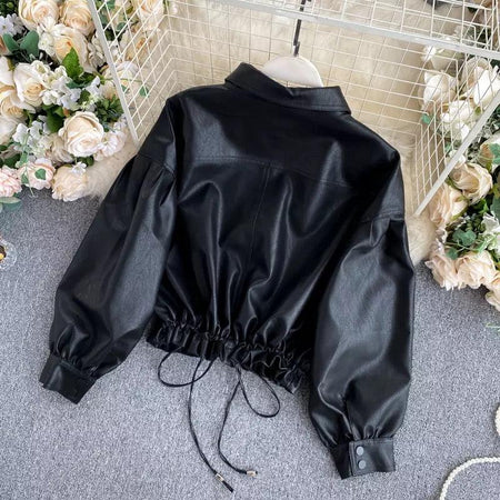 Moss PU Jacket In Black - back shot on hanger, black - Miss Mosa By Akanksha
