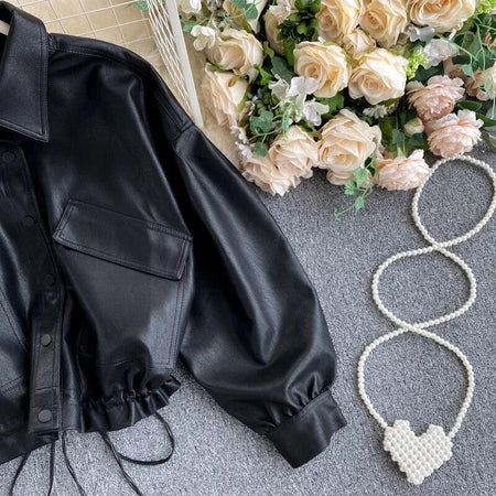 Moss PU Jacket In Black - styled flat-lay shot, black - Miss Mosa By Akanksha