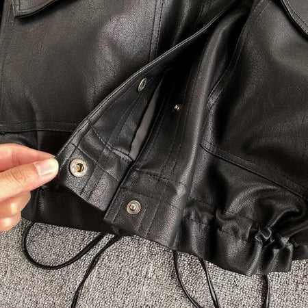 Moss PU Jacket In Black - close-up of cuff buttons, black - Miss Mosa By Akanksha