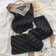Raisin Statement Tracksuits - styled flat-lay shot, black - Miss Mosa By Akanksha