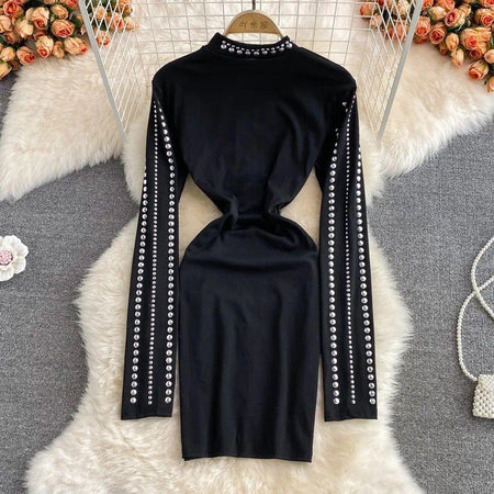 Sereya Riveted Luxe Dress In Black - back shot styled flat-lay, black - Miss Mosa By Akanksha