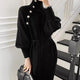 Sikura Winter Dress - lifestyle shot on model, black - Miss Mosa By Akanksha