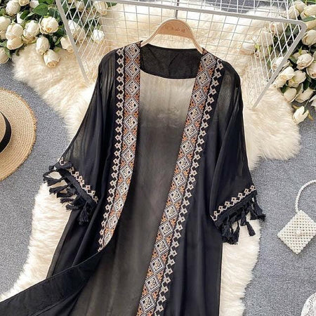 Sula Tasseled Cape - styled flat-lay shot, black - Miss Mosa By Akanksha