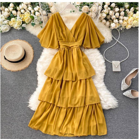 Taurel Flutter Sleeve Dress - front shot on hanger, mustard - Miss Mosa By Akanksha
