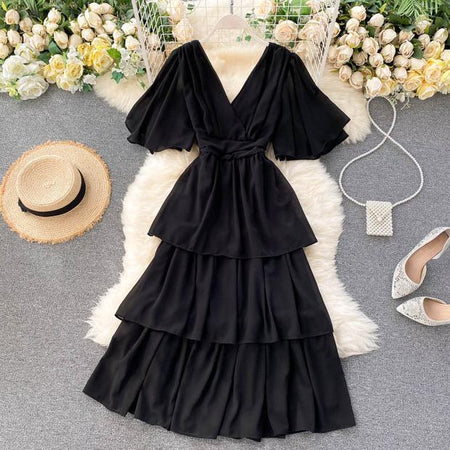 Taurel Flutter Sleeve Dress - front shot on hanger, black - Miss Mosa By Akanksha