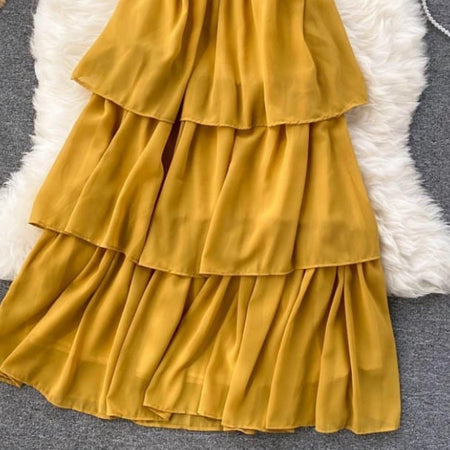 Taurel Flutter Sleeve Dress - close-up of tiers, mustard - Miss Mosa By Akanksha