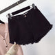 Telly Denim Shorts - front shot on hanger, black - Miss Mosa By Akanksha