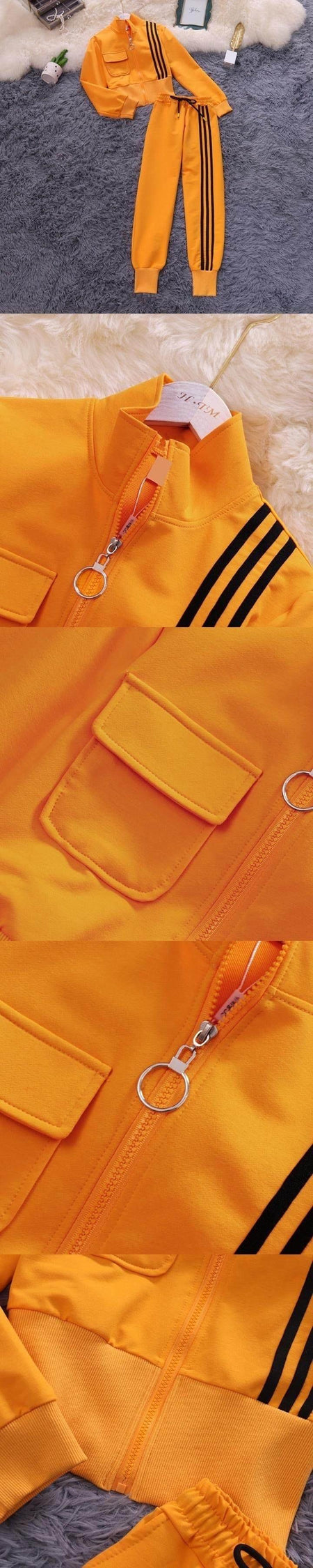 Trucker Statement Tracksuit - close-up of zip pocket, orange - Miss Mosa By Akanksha
