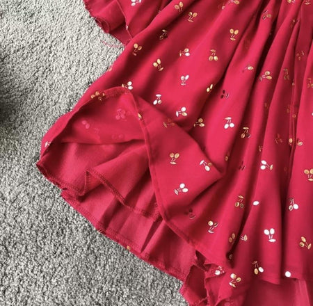 Vivian Bohemian Playsuit - close-up of flared sleeve, red - Miss Mosa By Akanksha