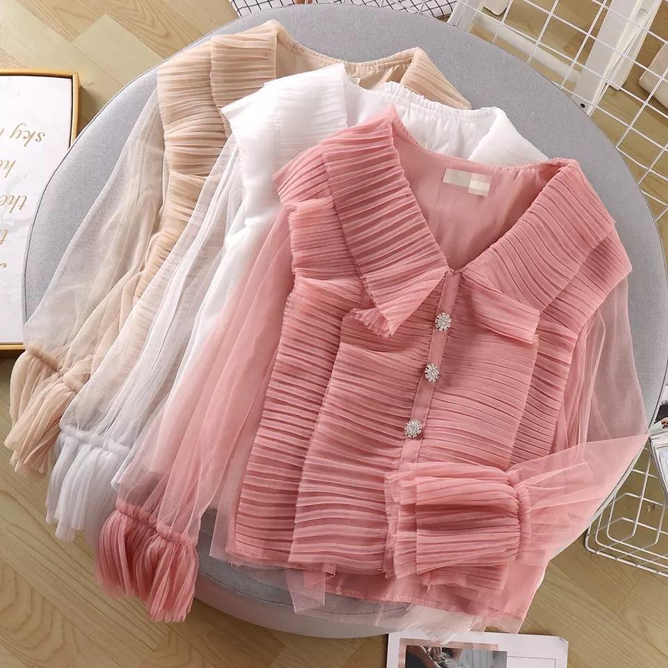 Discover Ruffle Tops for Women Online at a la mode